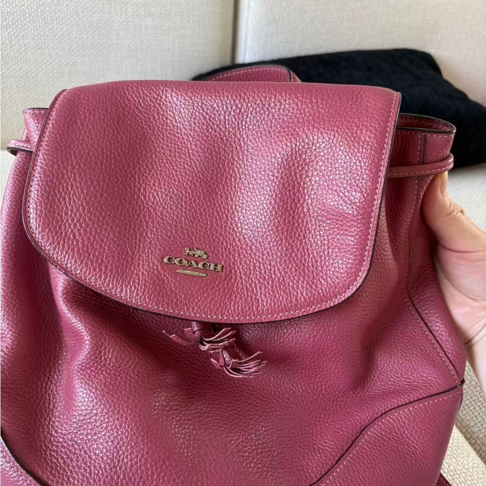 Coach Pebbled Leather Backpack in Raspberry-used several times,in good condition